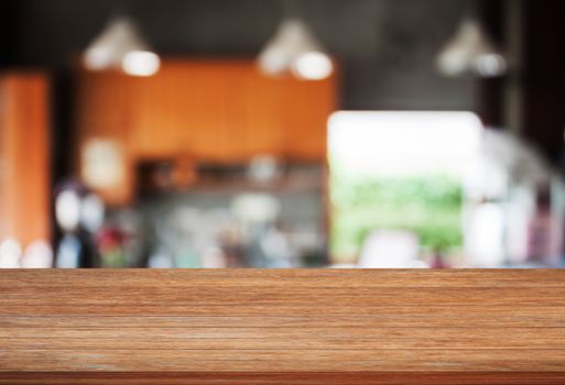 Top wooden with abstract blur coffee shop background, stock photo