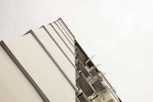 Look up at apartment housing in Thailand. Step of building.