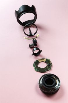 Components of a camera lens sorted and viewed from above