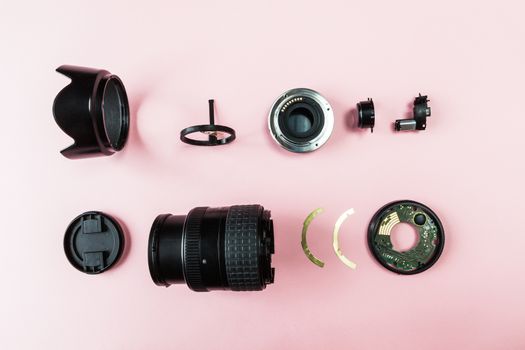 Components of a camera lens sorted and viewed from above