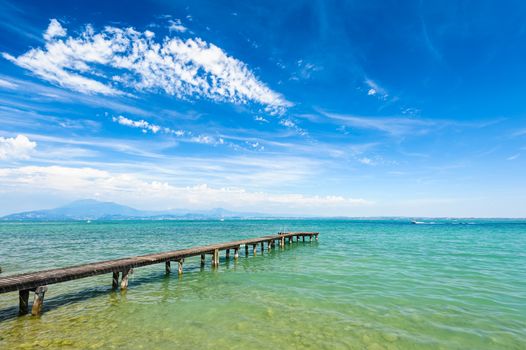 High mountains on other coast of Garda lake, Desenzano, italy