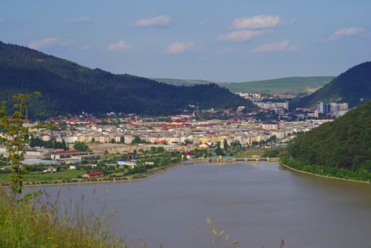 City on Bistrita valley river in Romania (piatra Neamt, aerial view)
