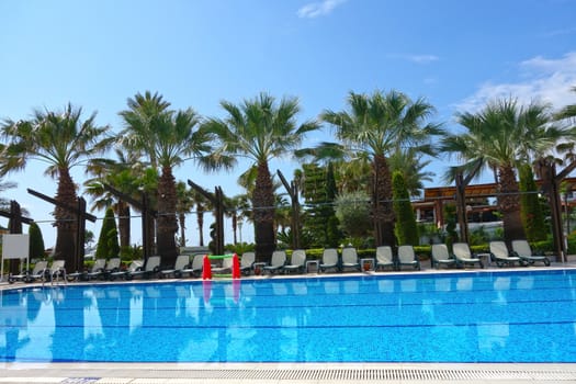 Beach resort hotel swimming pool area in Turkey