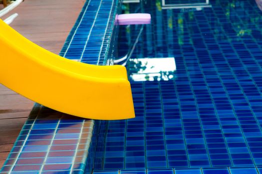 Pool Slide Swimming public pool slide blue water outdoors