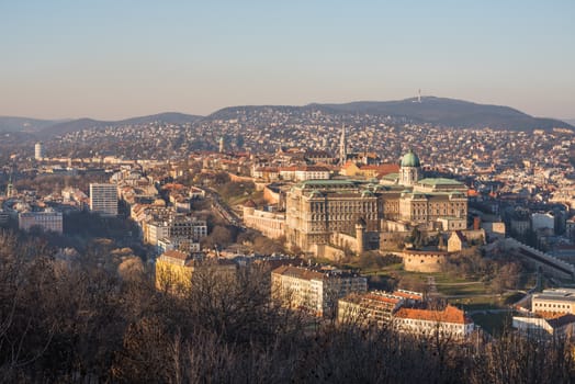 Buda Castle or Royal Palace in Budapest, Hungary Lit by Setting Sun