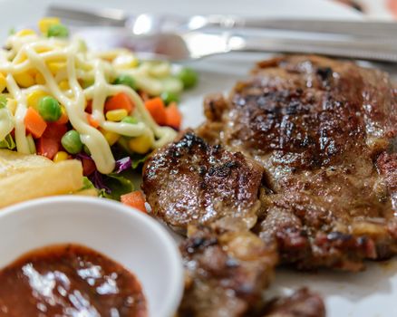 Beef steak on plate.Soft focus.