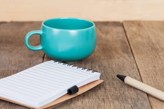 cup of coffee with book note
