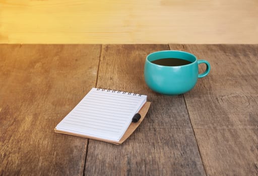 cup of coffee with book note