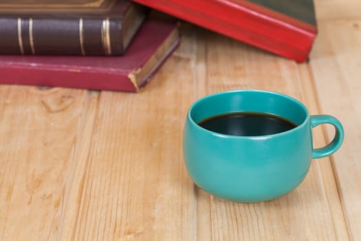 cup of coffee  on  wood table