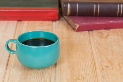 cup of coffee  on  wood table