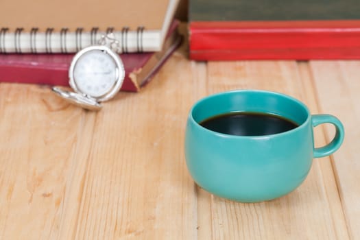 cup of coffee  on  wood table