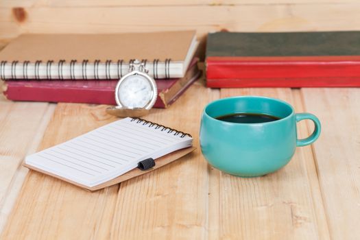 cup of coffee  on  wood table