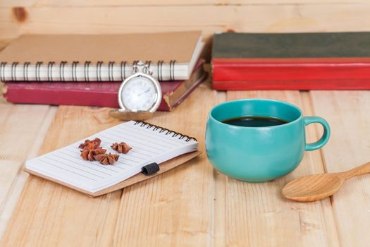 cup of coffee  on  wood table