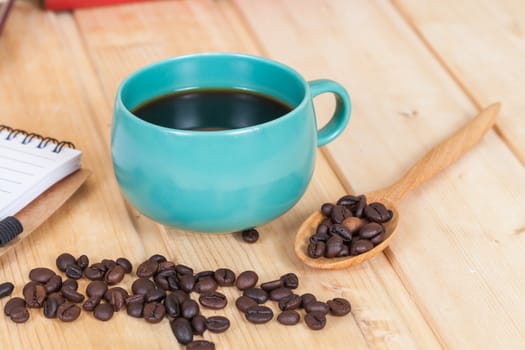 cup of coffee  on  wood table