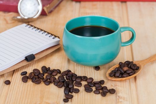 cup of coffee  on  wood table