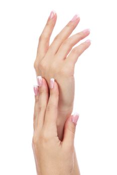 Beautiful female hands isolated on white background