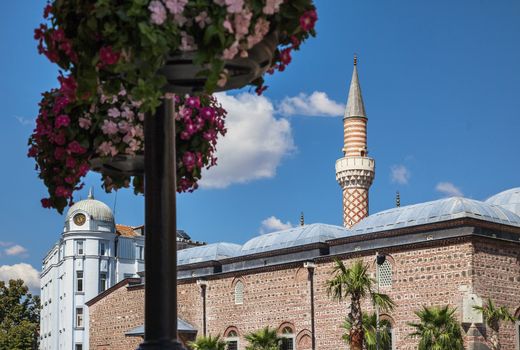 Dzhumaya, Djumaya Mosque or Cuma Camii in turkish, downtown Plovdiv view with flowers on a sunny summer day.