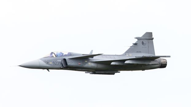 LEEUWARDEN, THE NETHERLANDS-JUNE 10: Modern tactical fighter jet JAS-39 Gripen performs at the Dutch Airshow on June 10, 2016 at Leeuwarden Airfield, The Netherlands.