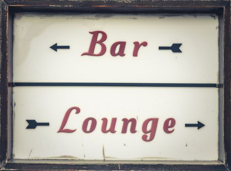 Grungy Vintage Bar Sign Outside A UK Pub