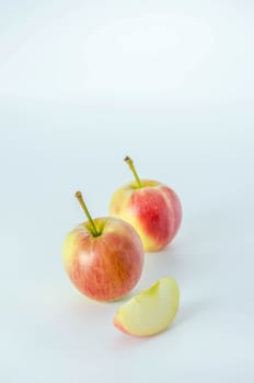 Red and yellow apple  with bamboo basket , organic fresh fruit.
