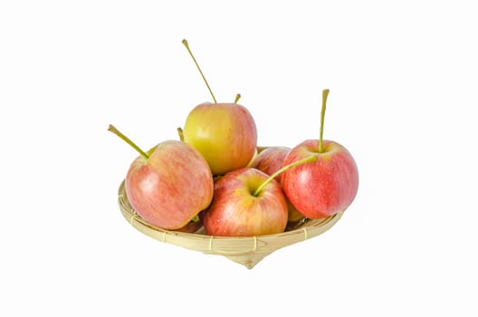 Red and yellow apple  with bamboo basket , organic fresh fruit.