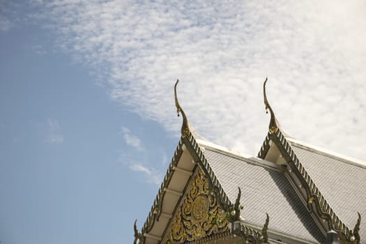 Serpent sculpture of temple roof in Thailand. ornament and detail in Thai art.