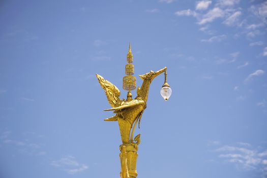 Golden swan or Lantern hanger statue in Thailand. Traditional style lighting lamp of Thai.