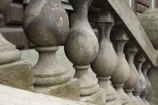 old stone balusters staircase handrail close-up