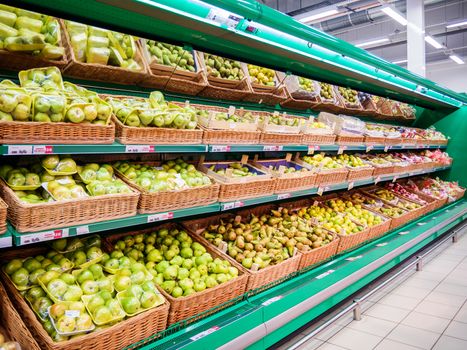 Fresh fruits on shelf in supermarket. For healthy concept