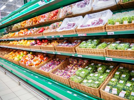 Fresh fruits on shelf in supermarket. For healthy concept