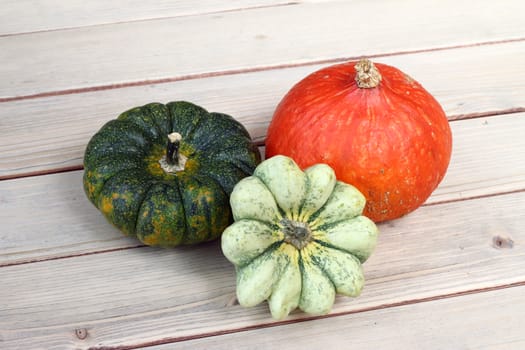 Detail of the pumpkins on wooden board