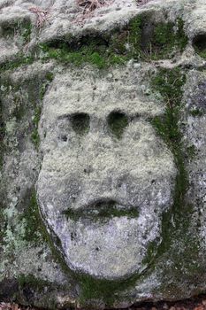 Scary Stone Heads - rock sculptures of giant heads carved into the sandstone cliffs in the pine forest above the village Zelizy in the district Melnik, Czech republic. It is the works of sculptor Vaclav Levy, who created in the period 1841-1846.