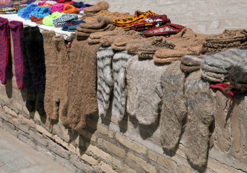 Street market with knitted socks and slippers, Khiva, Uzbekistan