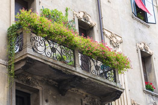 exterior of an old building windows and balcony