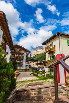 Village street on a background of the Alps Italy