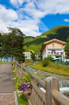 Village street on a background of the Alps Italy