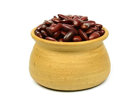 Red beans on clay pot isolated on white background