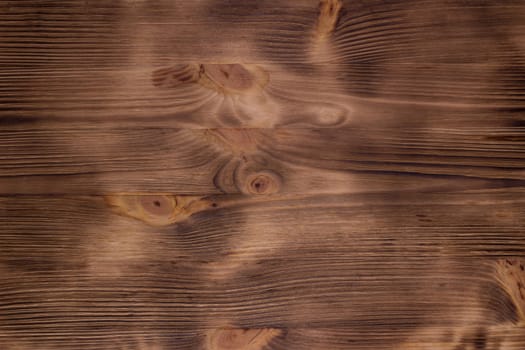 Warm brown - burned and brushed - wooden natural background