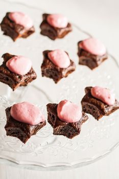 Chocolate cupcakes with pink stars-cream celebratory glass stand