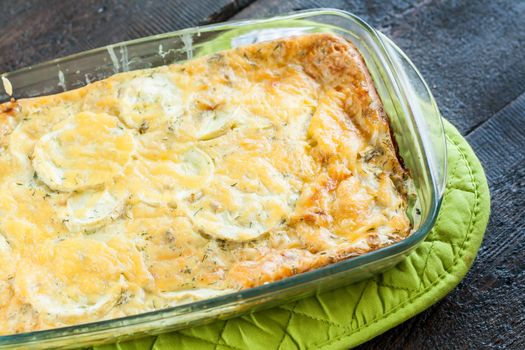 casserole of zucchini squash in a glass form.