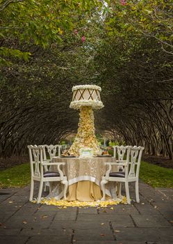 Amazing Wedding Table Setup with towering floral arrangement