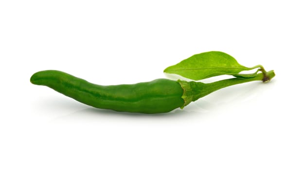 Green pepper with leaf on a white background (Thai pepper)