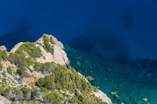 Sea rocks and transparent sea.