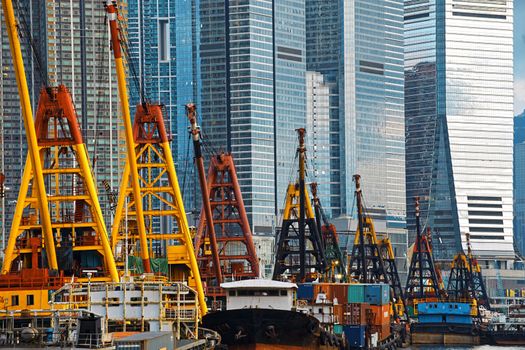 International Commerce Center ICC Building Kowloon Hong Kong Harbor with cargo ship