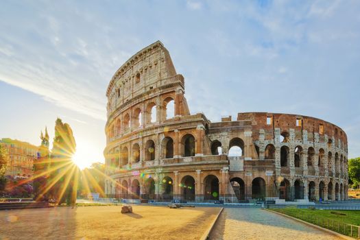 Colosseum in Rome and morning sun, Italy, Europe.