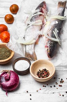Freshly caught fish and spices cooking cooking