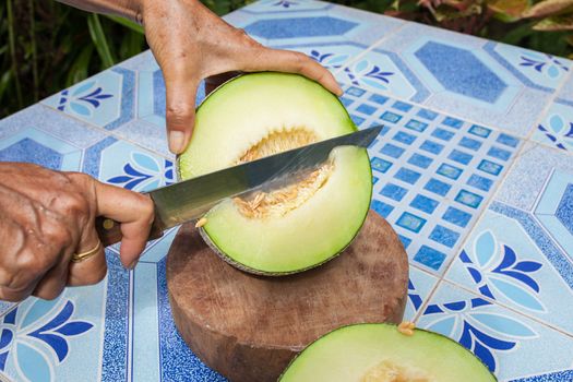 Melon on the table or Cantaloupe salad. Slices of melon on a table.