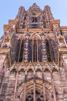 The impressive bell tower of the Notre Dame cathedral from Strasbourg, France. Famous for its architecture and the fact that it's the 6th tallest church in the world