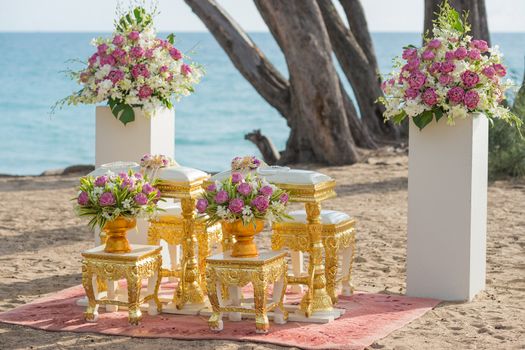 Setup for hand pouring in thai wedding ceremony at the beach front.
