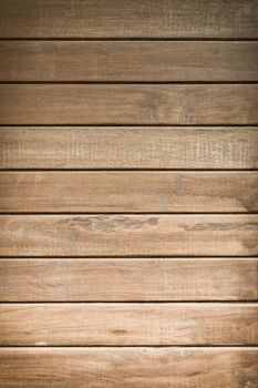 Horizontal wooden pattern texture in vertical image. Light brown wooden background.